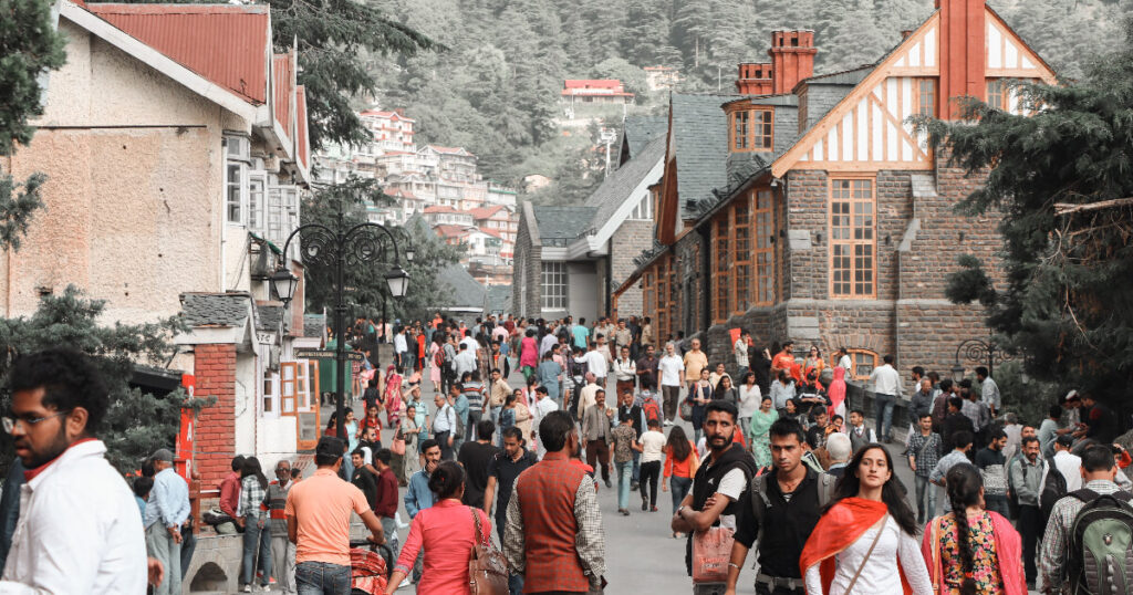 old Himachal houses, people walking in street, crowds in Himachal Pradesh, Indians crowd.